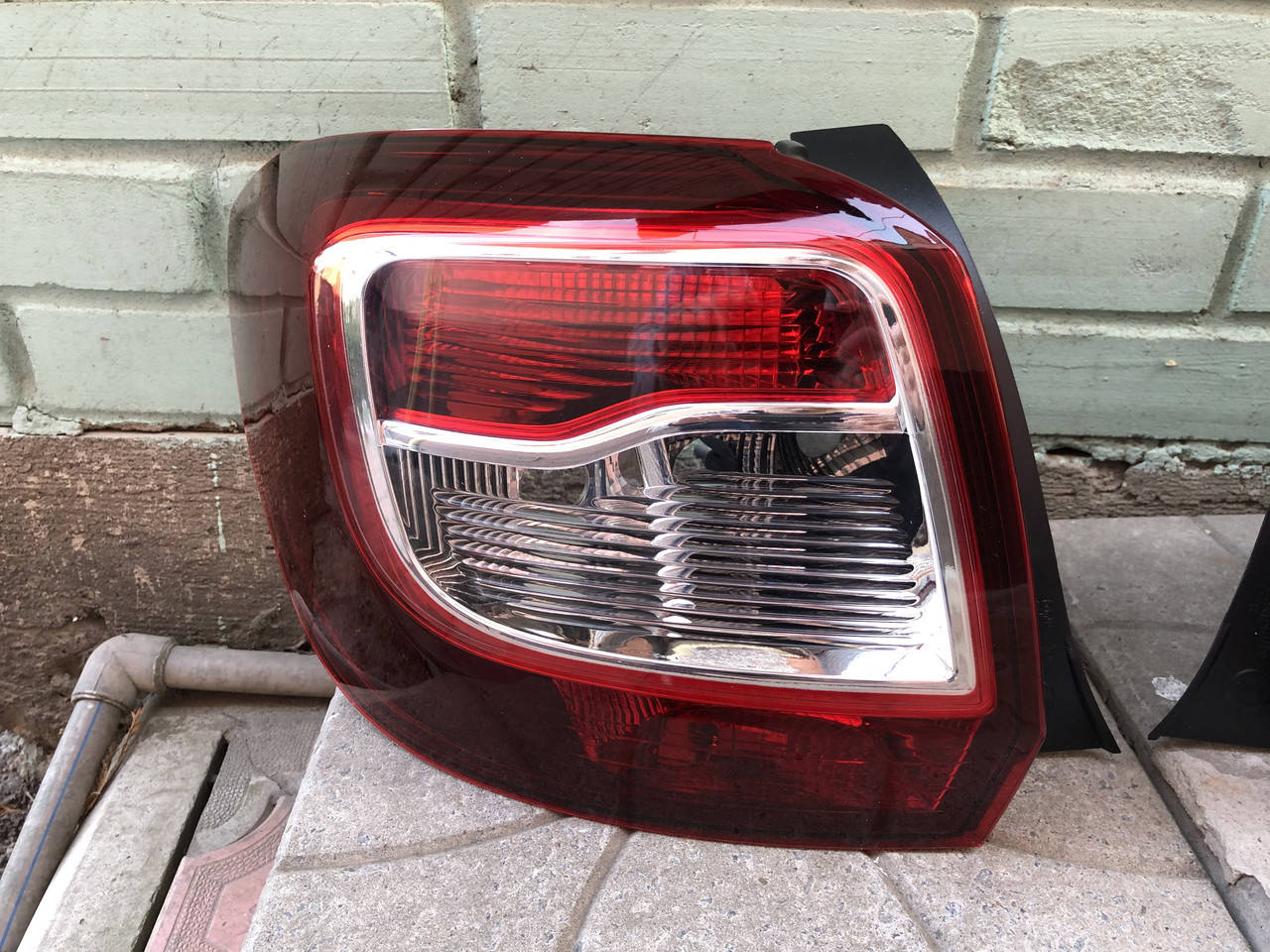 

Задний фонарь левый Renault Sandero Stepway, (Рено Сандеро Степвей) 2013-2017 (Depo) темный