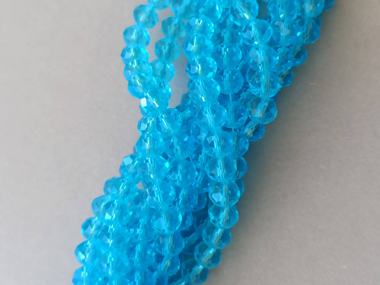 

Бусины хрустальные (Рондель) 6*4 мм, пачка 90-95 шт, цвет - голубой