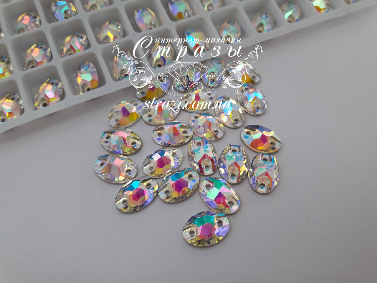 

Стразы пришивные Lux Овал 7*10мм. Crystal AB