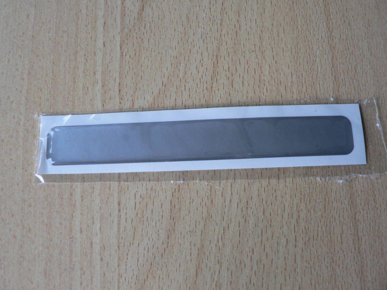 

Наклейка s силиконовая Полоса 120х16х1мм серая без надписи на авто, Серый