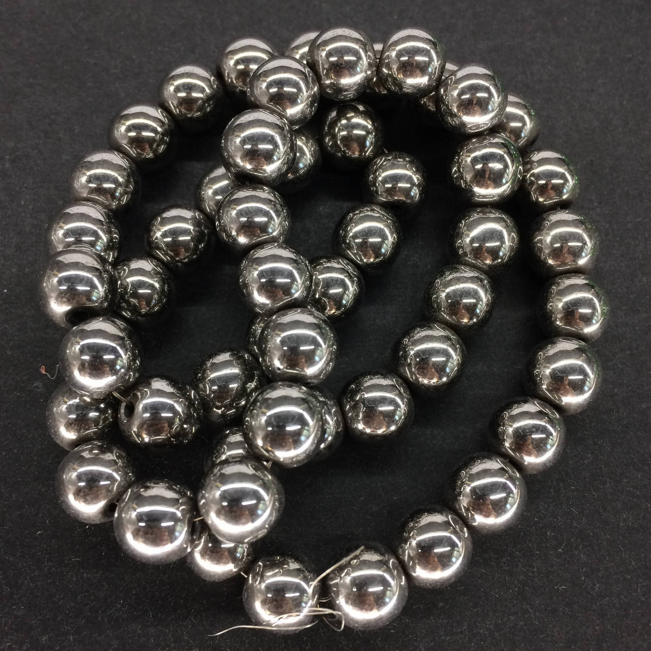 

Бусины на нитке Гематит цвет темное серебро d=8 мм