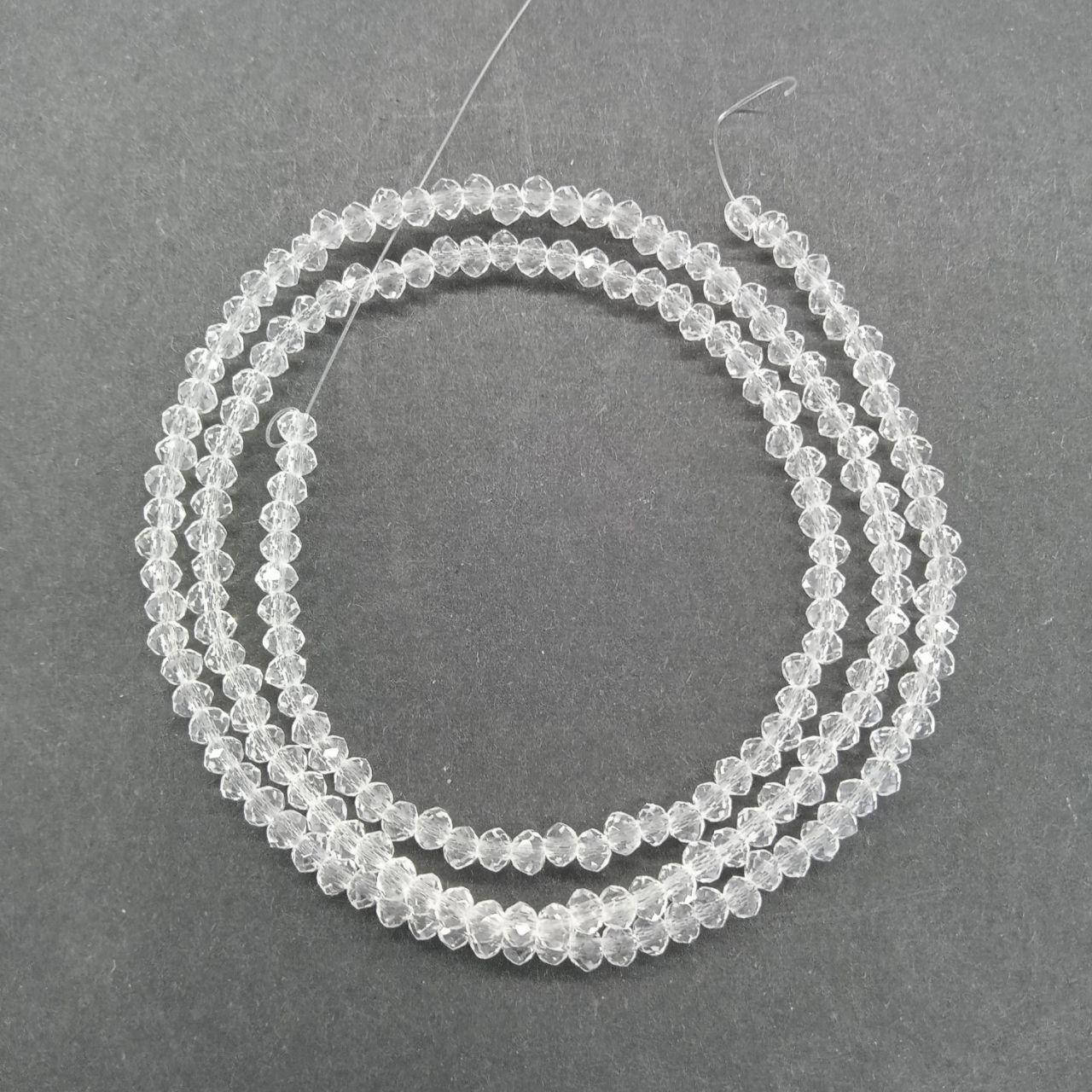 

Бусины на нитке Стекло рондель d=2мм цвет белый прозрачный (~190 бусин на на нитке)