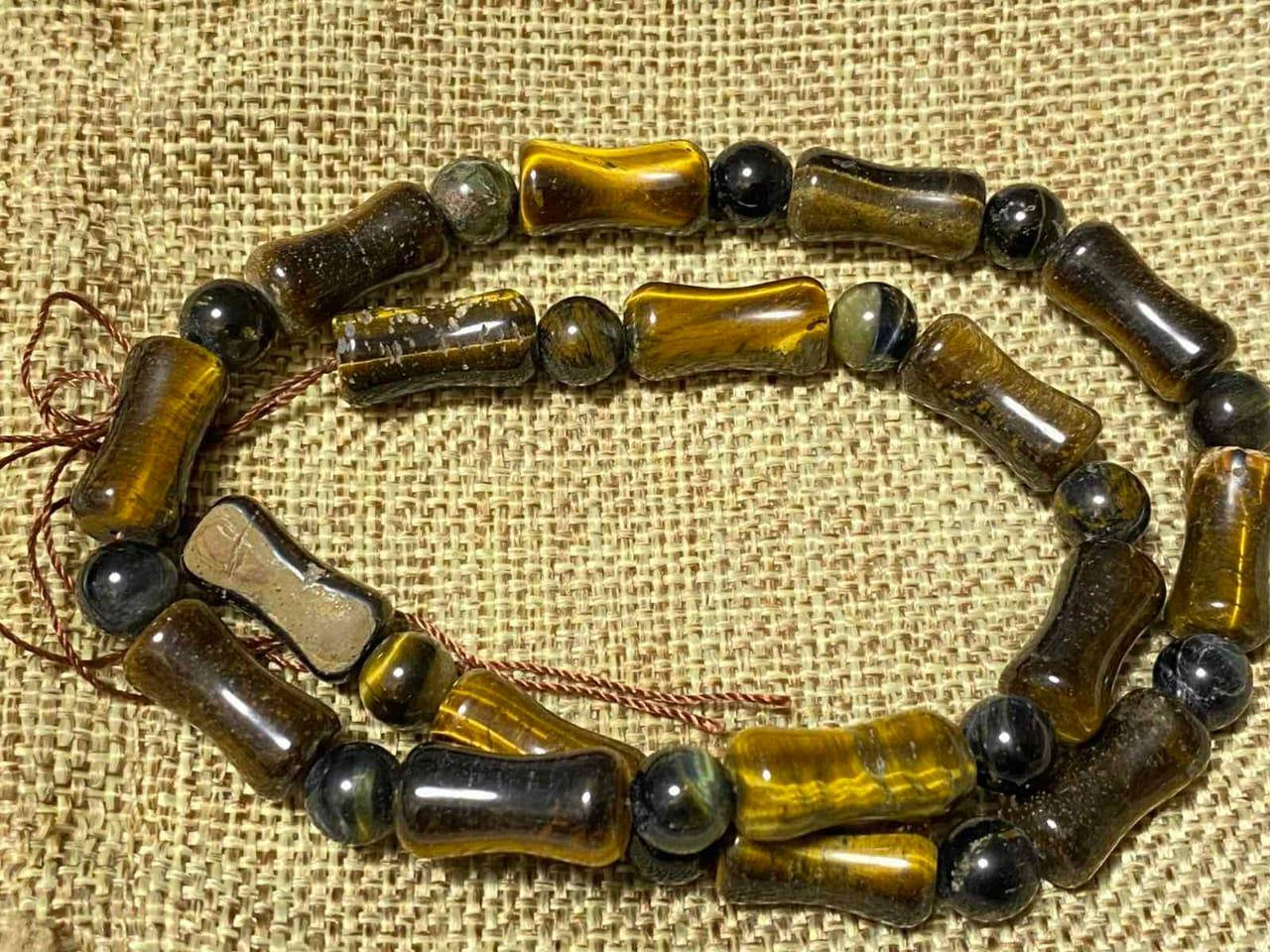 

Бусины на нитке Тигровый глаз d-15х7мм(+-) L-37см