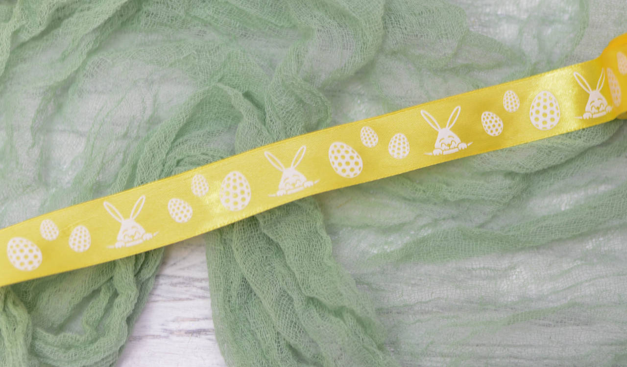 

Лента атлас 2,5см с пасхальн. кроликами. Желтая