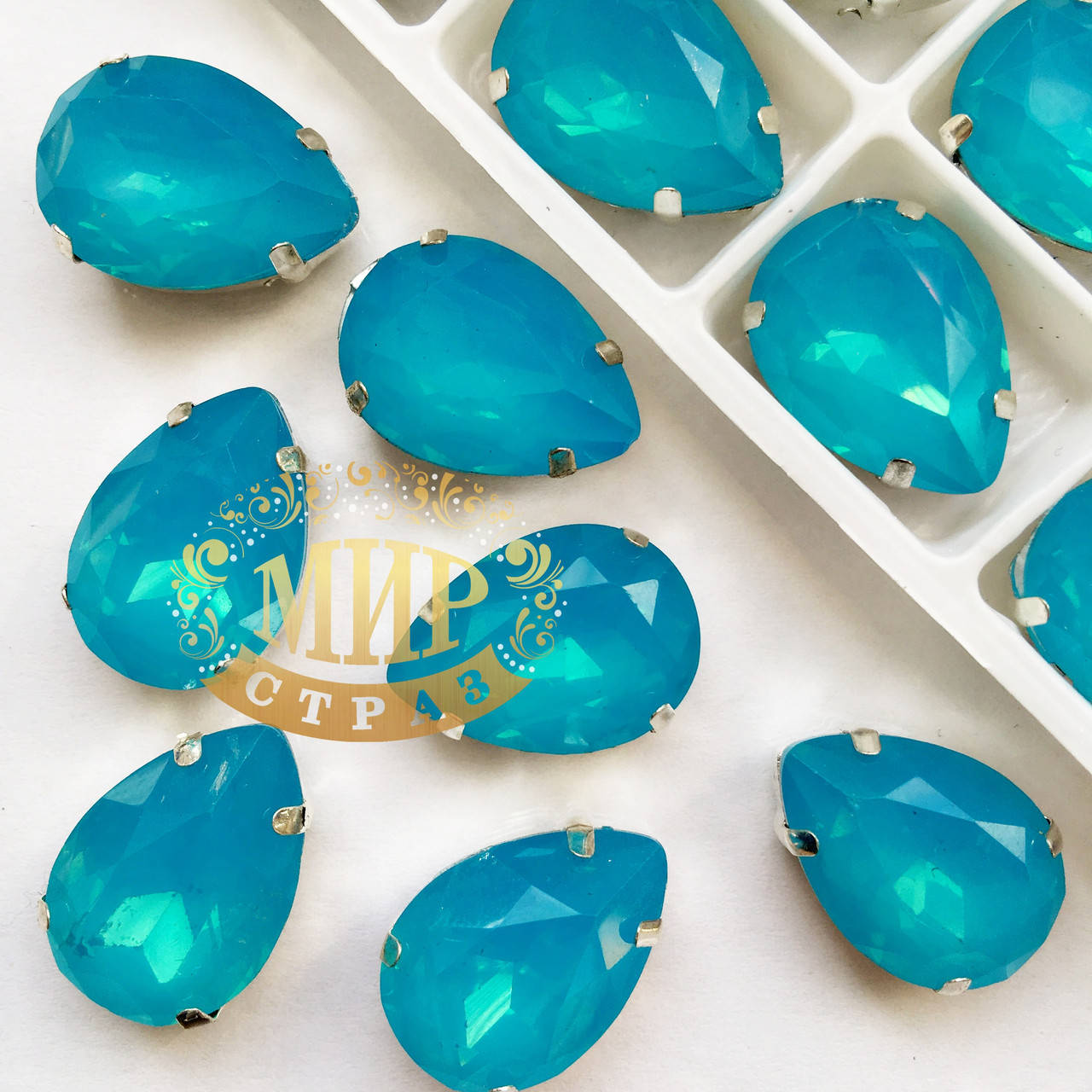 

Cтразы в цапах, Капля, Размер 13x18, Цвет Aquamarine OPAL