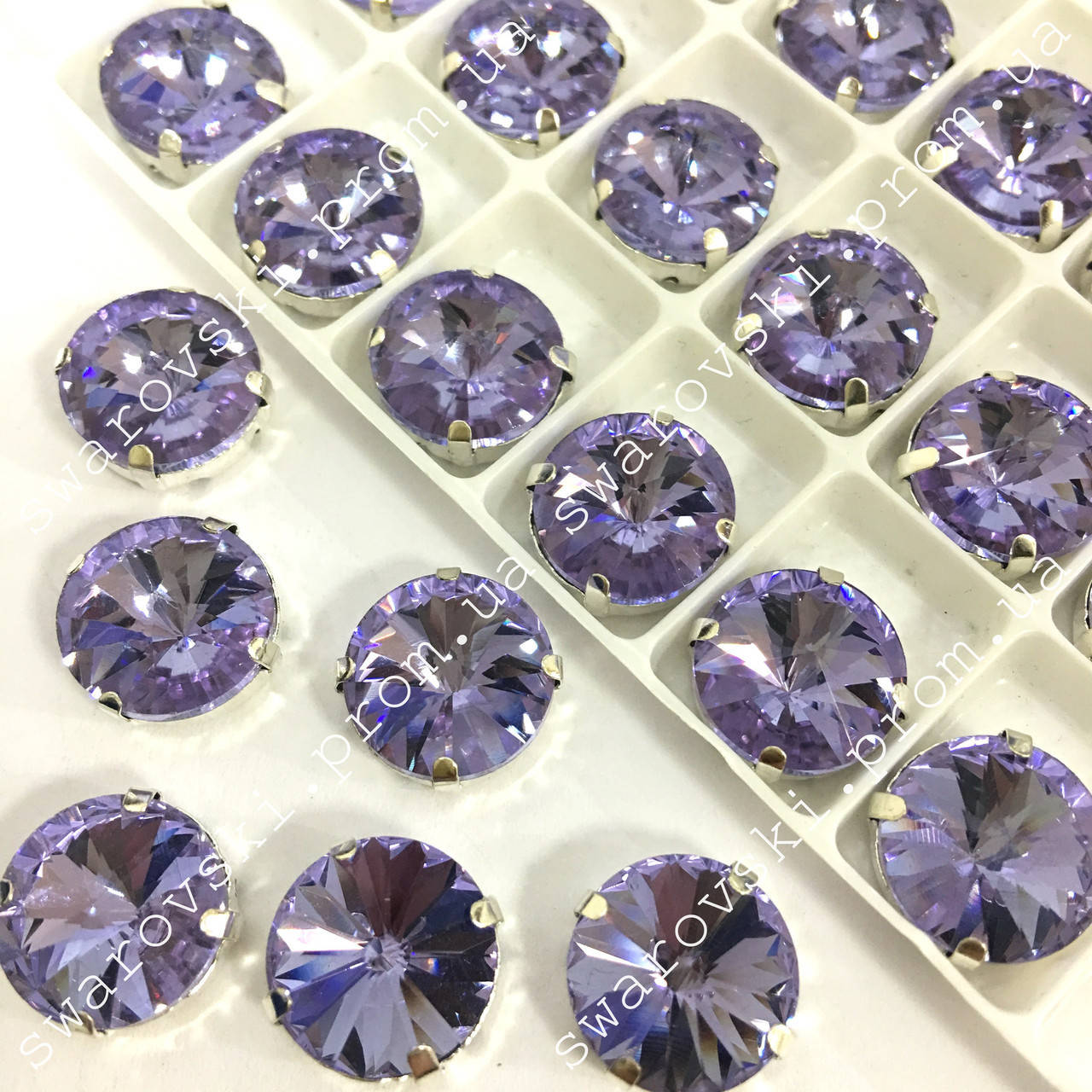 

Стразы в цапах 10мм, цвет Lt Purple, 1шт, Черный