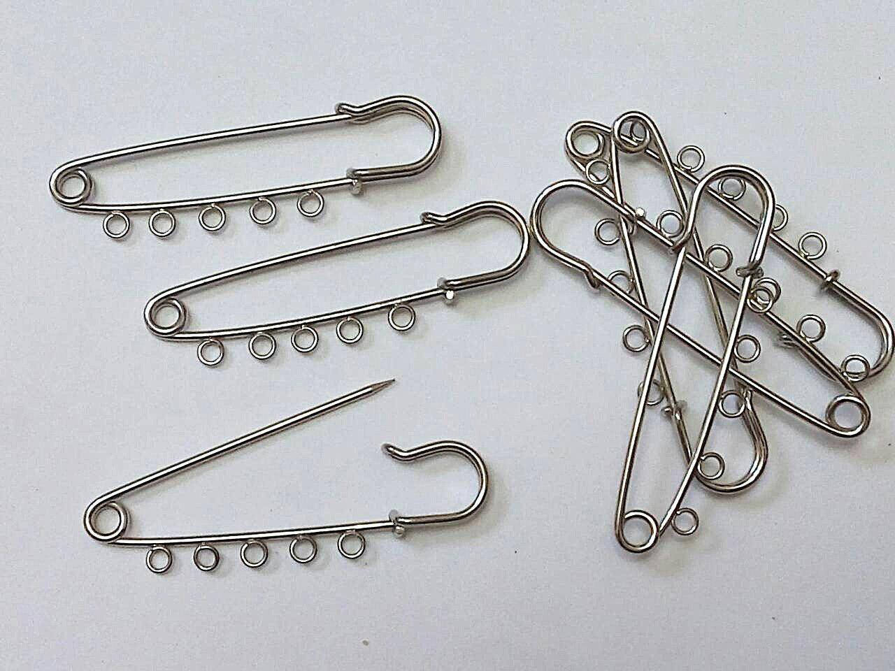 

Брошка булавка 7,5 см На 5 петель