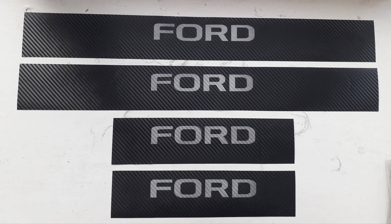 

Карбоновые наклейки на пороги Ford Focus II