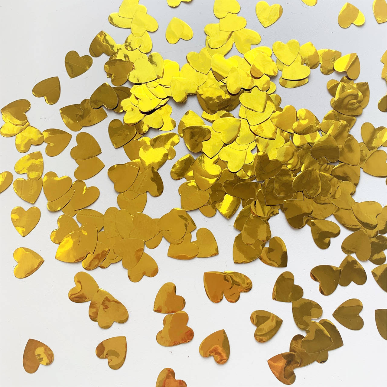 

Конфетти-Метафан Золотые Сердца 1,5 см. Конфетти для Декора, Конфетти для пушки (100 грамм)