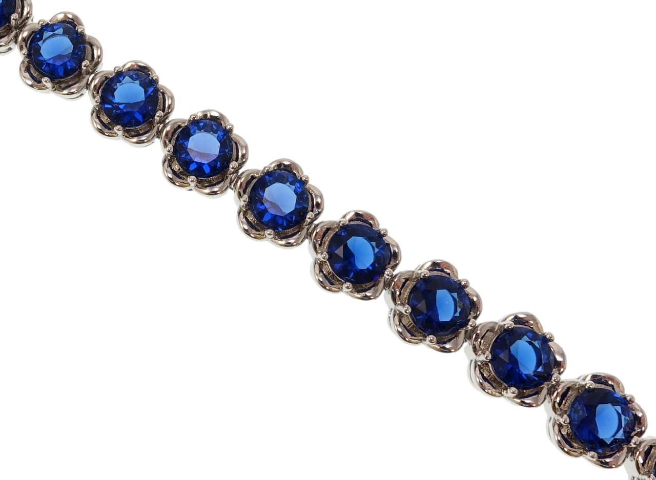 

Браслет Xuping Родий "Цветочки с синими фианитами" размер с доп.замком 17.5,19.5см х 8мм