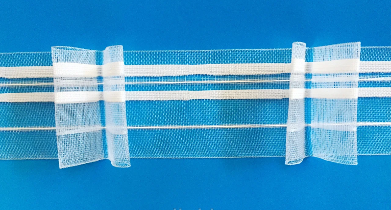 

Шторная тесьма прозрачная 60мм. 907тс