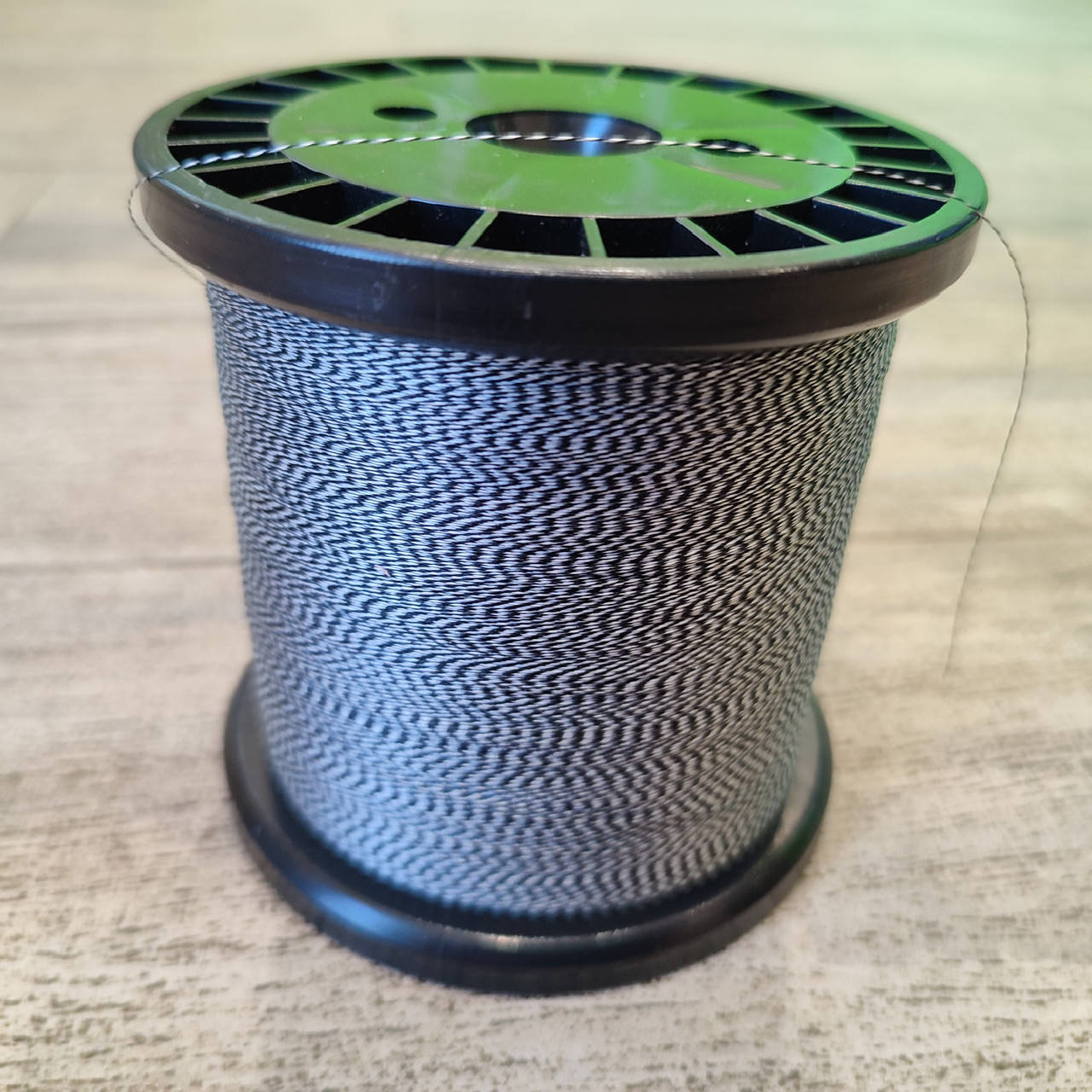 

Поводковый материал на карпа "Dyneema" 30lb. Нить поводковая., Серый