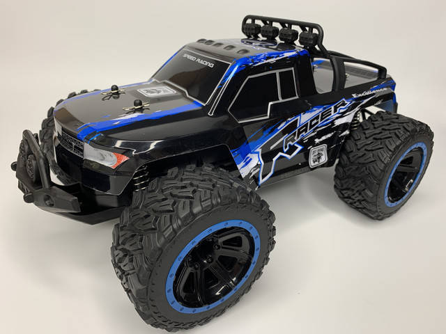 

Машинка внедорожник на пульте управления 1:14 с защитными бамперами, ездит по бездорожью до 20-25 км/час