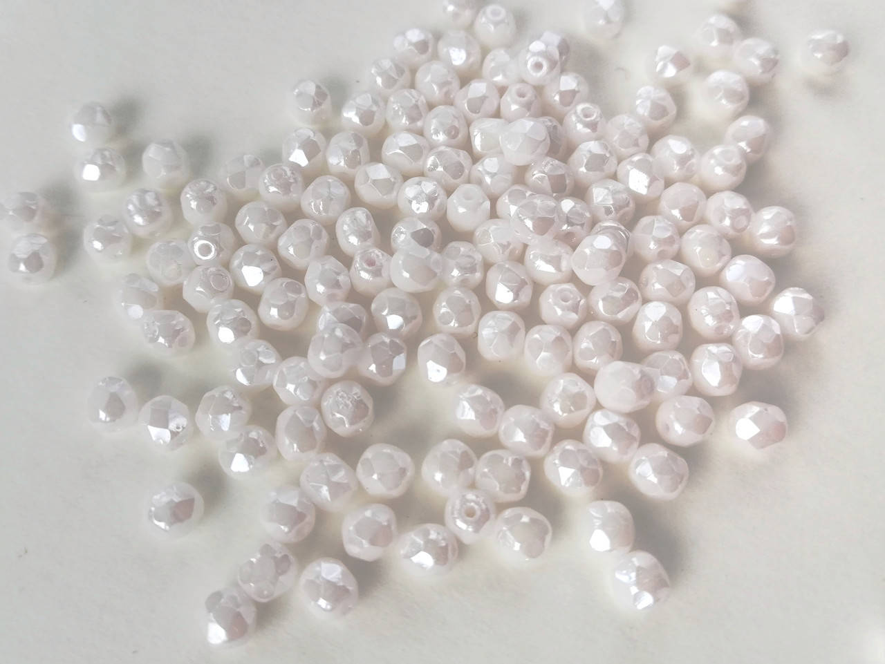 

Fire polished 4 mm Chalk White Shimmer