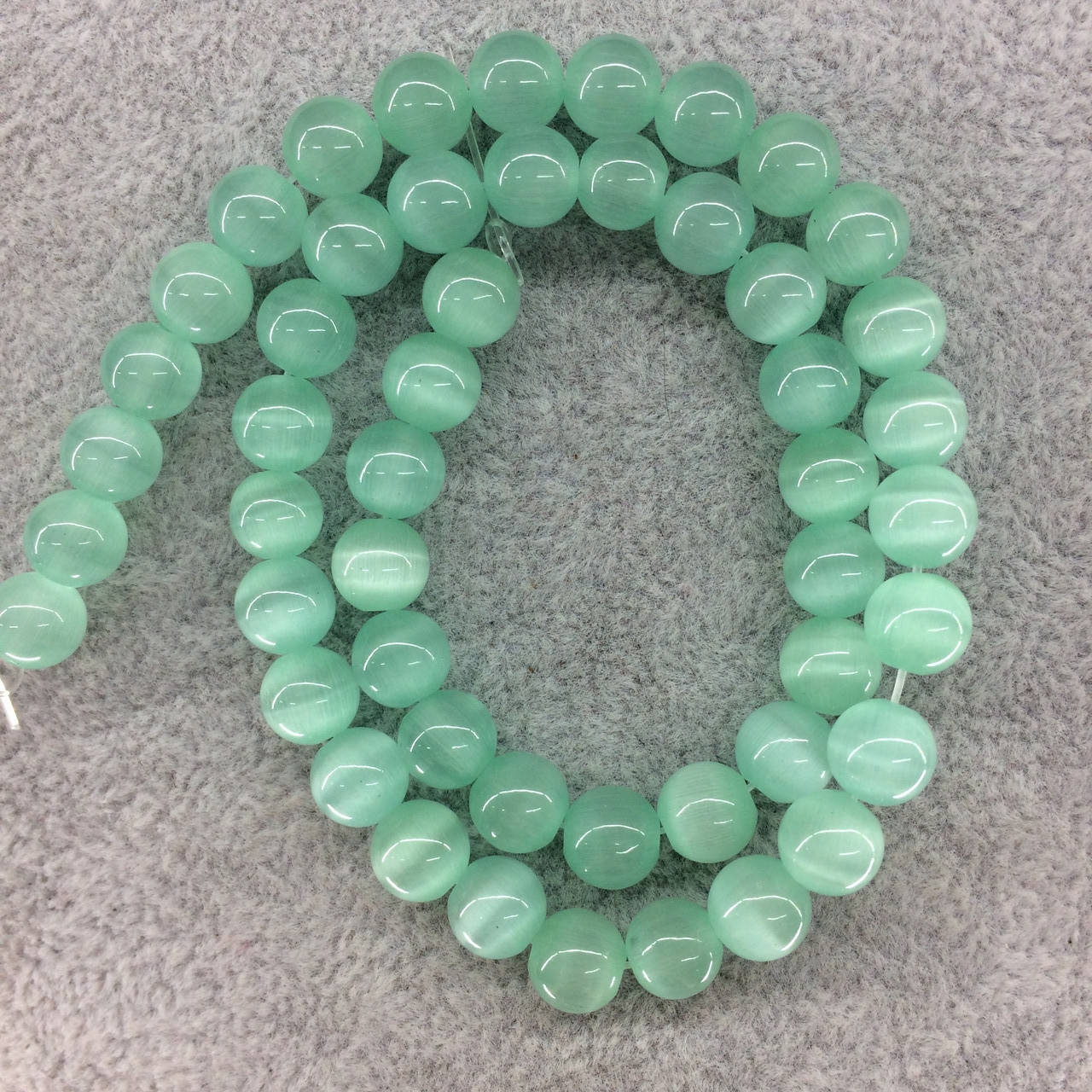 

Бусины на нитке Кошачий глаз цвет бледно-голубой d=8мм