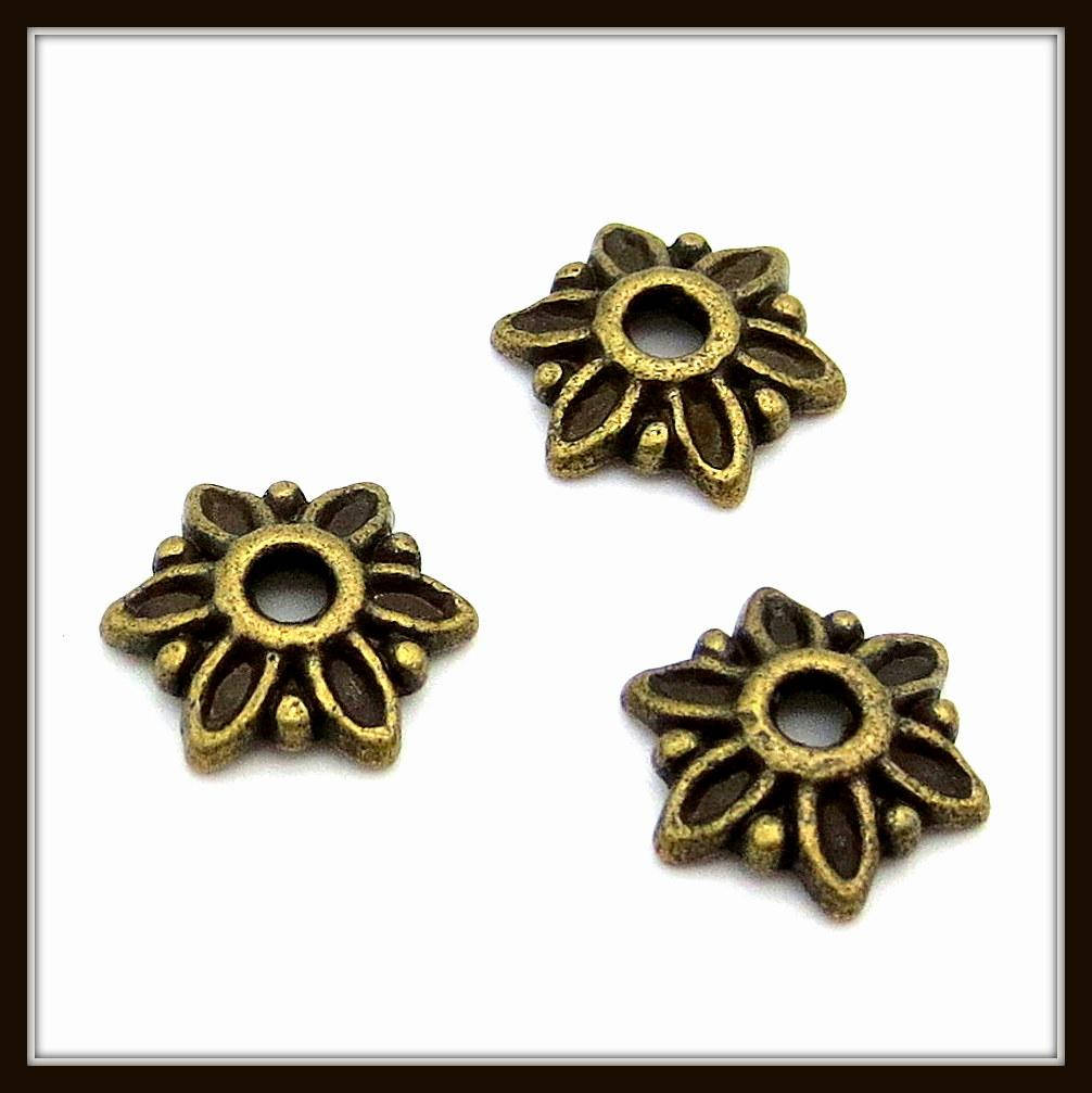 

Обниматели для бусин бали "бронза" (0,8 см) 40 шт в уп.