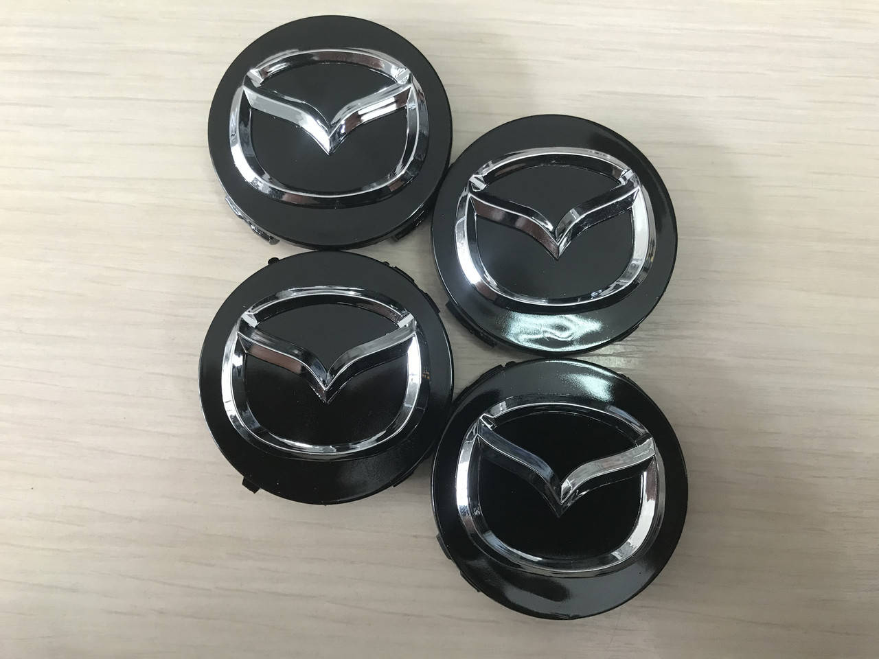 

Колпачки заглушки в литые диски Mazda/Мазда 56/55/7 мм. 167-CAP Черные/Хром