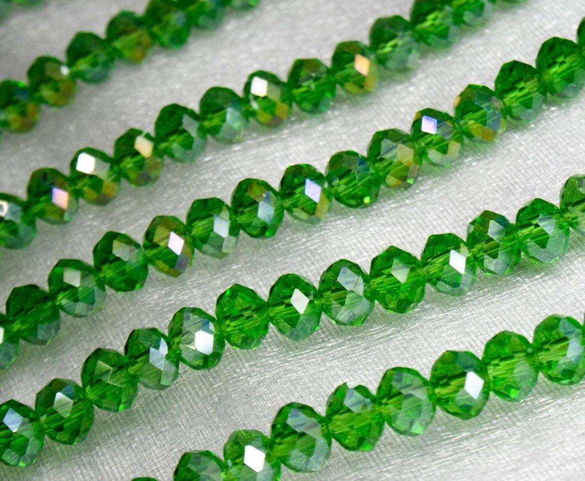 

Бусины хрустальные (Рондель) 6х4 мм пачка - примерно 95-105 шт, зеленый прозрачный с АБ (сп7нг-5647), Зелёный