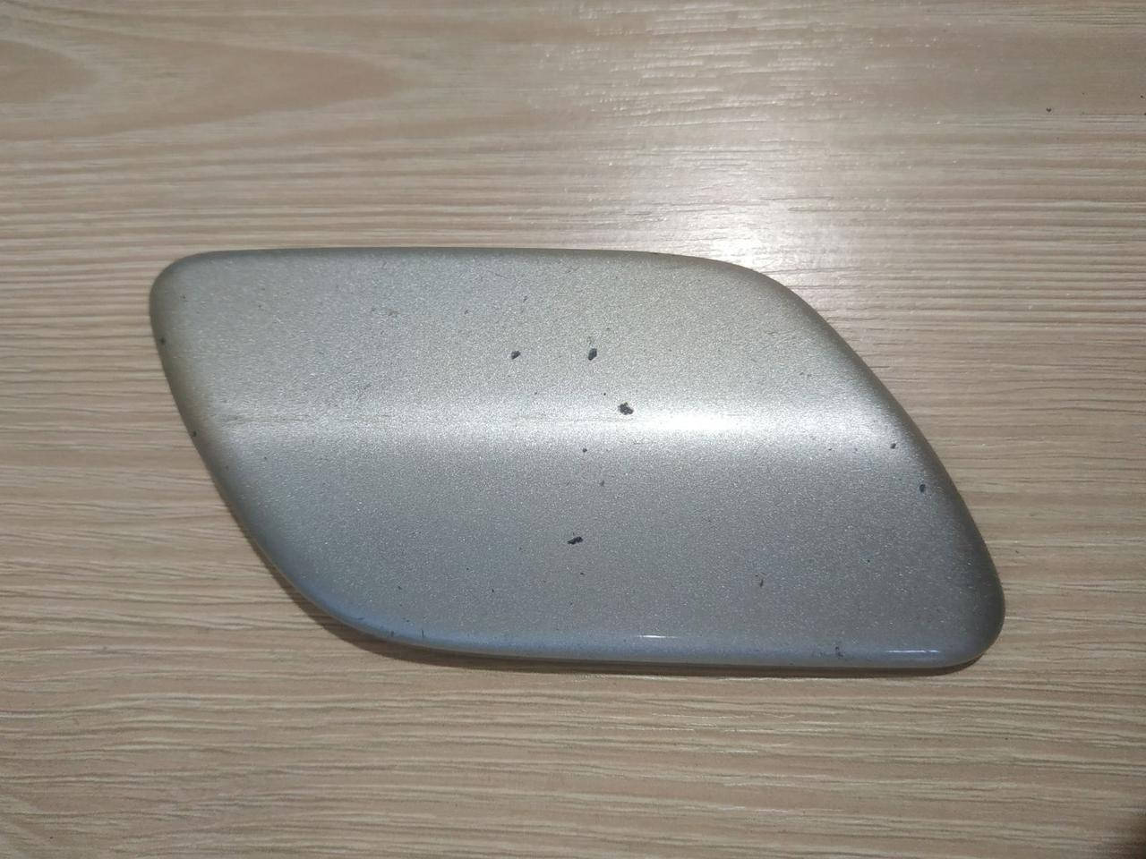

Накладка форсунки омивача передньої фари Opel Astra h 13225751
