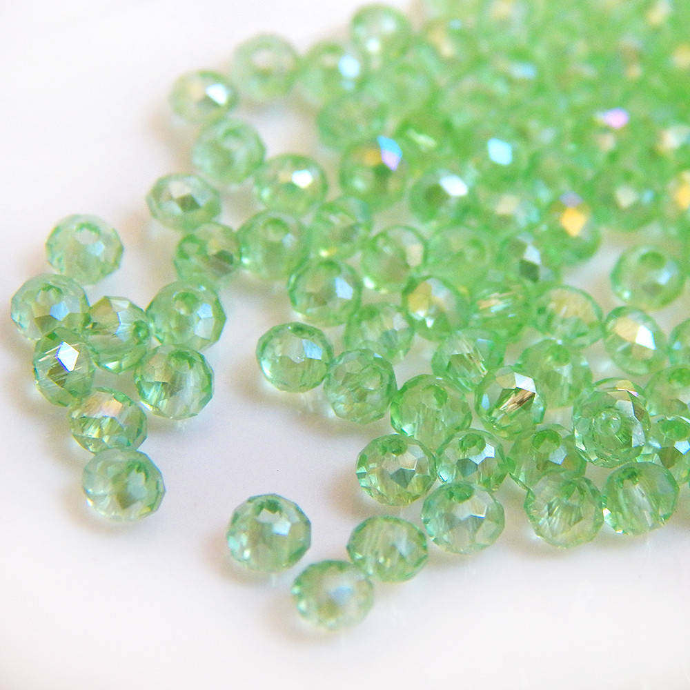 

Бусины хрустальные 2х2 мм, светло-зеленый прозрачный с АБ (уп.165-175 шт)