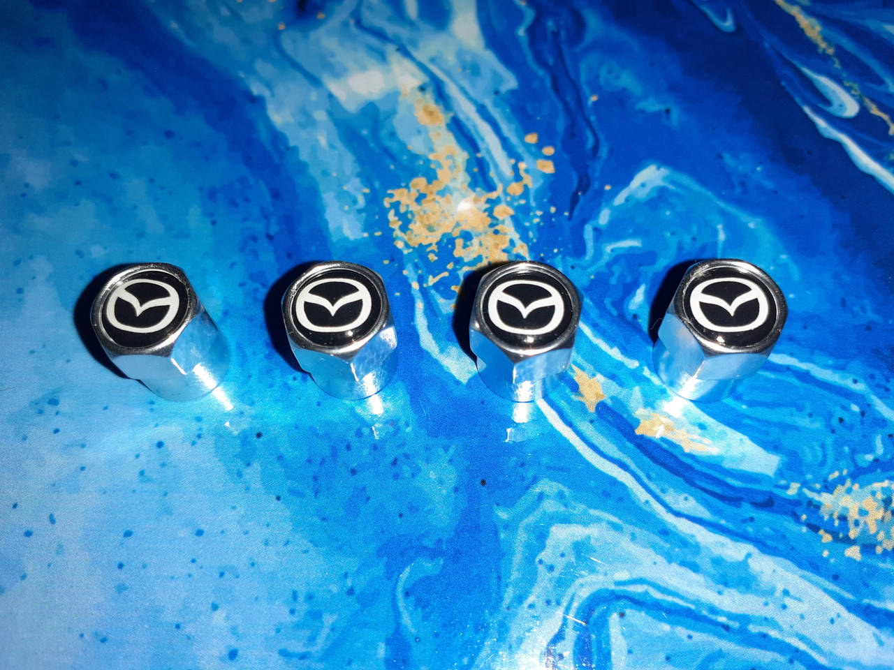 

Mazda мазда колпачки на ниппеля ( золотники )