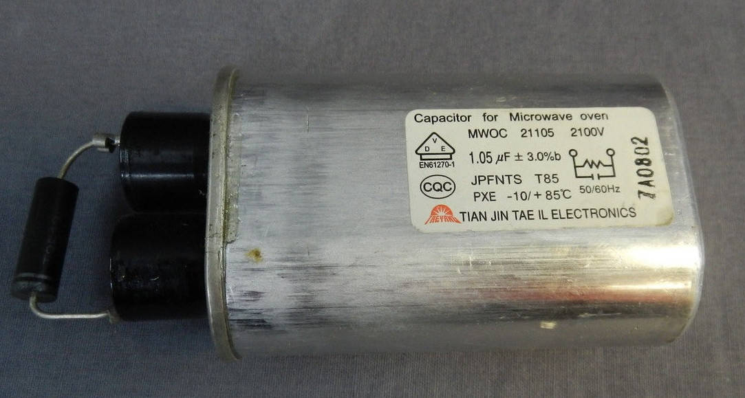 

Высоковольтный конденсатор 1.05uF 2100V для СВЧ печи LG 0CZZW1H004C EAE61082101