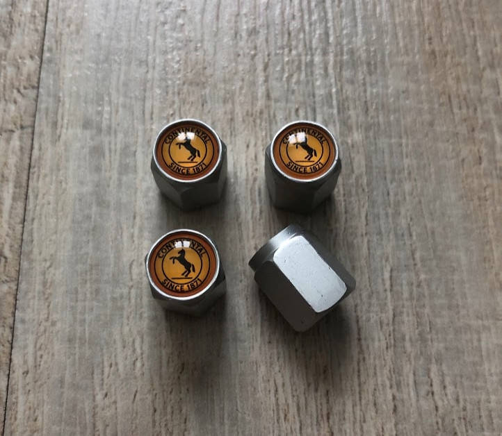 

Ковпачки На Ніппеля Золотник Continental Колпачки на ниппель