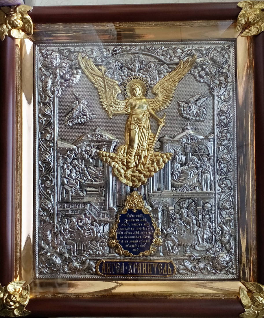 

Икона Ангел Хранитель в Украине серебряная с позолотой с позолоченными херувимами