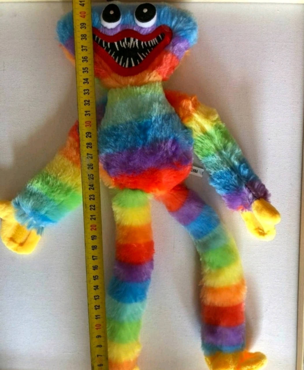 

Мягкая игрушка обнимашка Хаги Ваги Huggy Wuggy радужный 40 см, Разные цвета