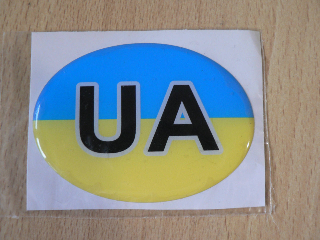 

Наклейка S силиконовая UA Украина 74х53х1.3мм флаг желто синяя овал на авто