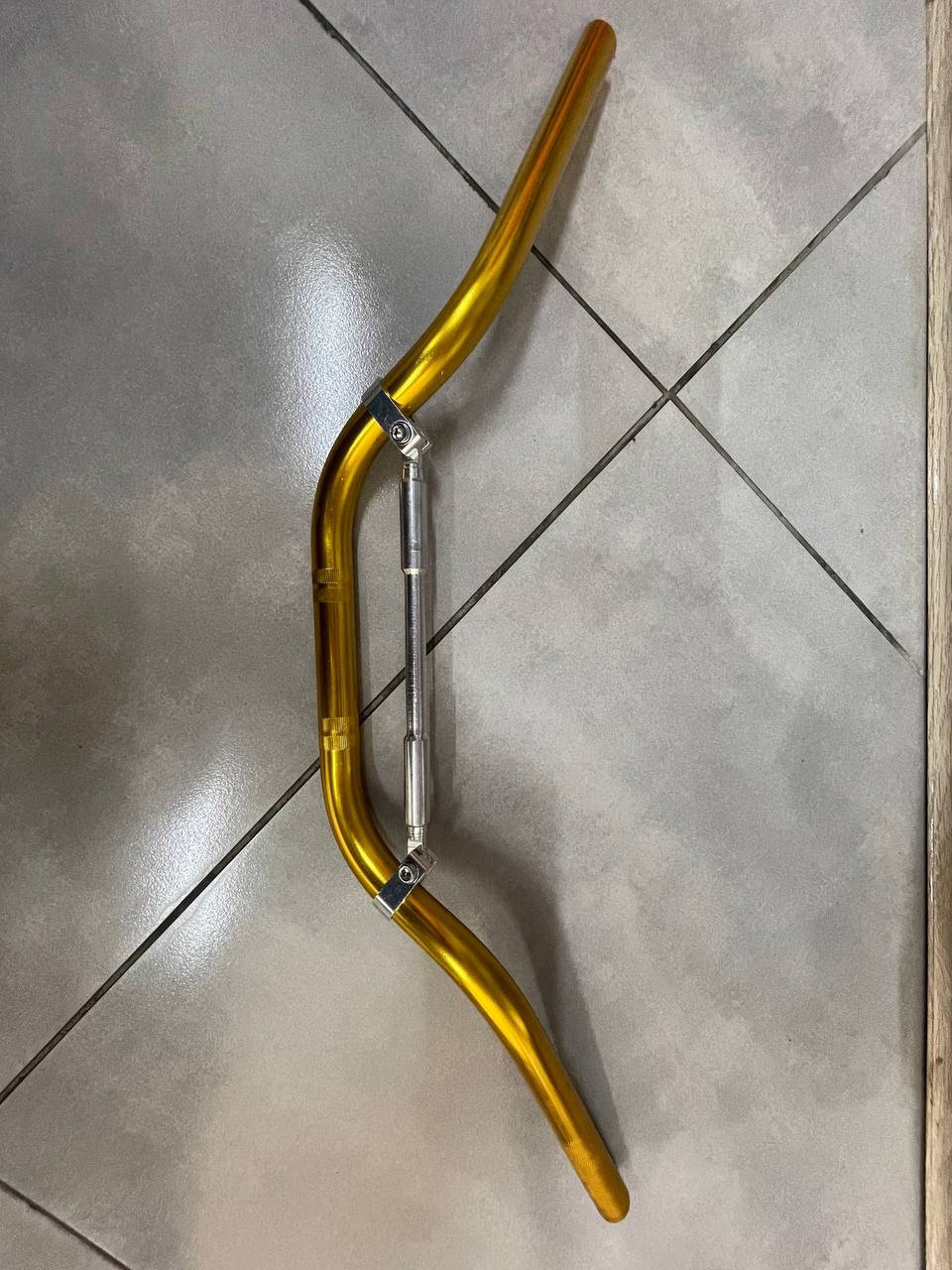 

Руль с распоркой, универсальный, золотой