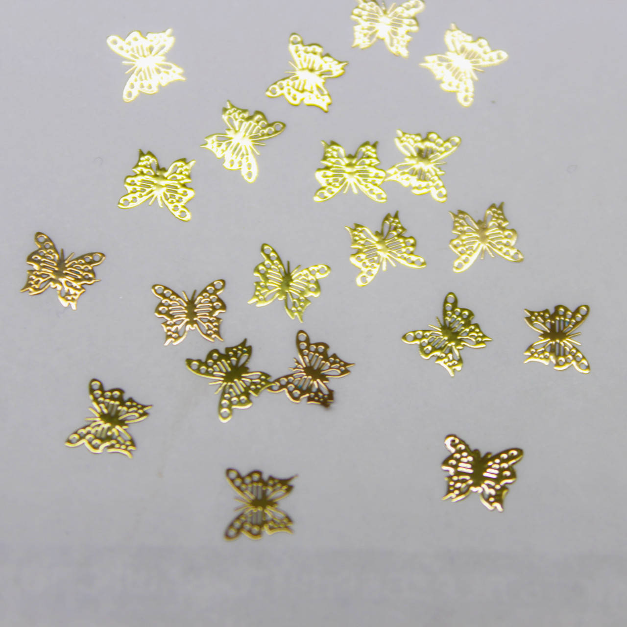 

Наклейки-металлики бабочки для нейл-арта №2.Упаковка 20шт