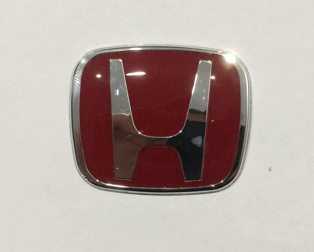 

Эмблема руля Honda 50ммx40мм красная