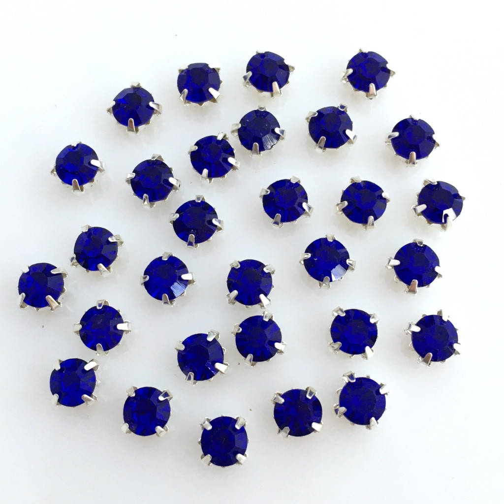 

Шатони 5 мм. Сапфір (сапфир). Колір оправи: срібний. (Ціна за 1 шт)