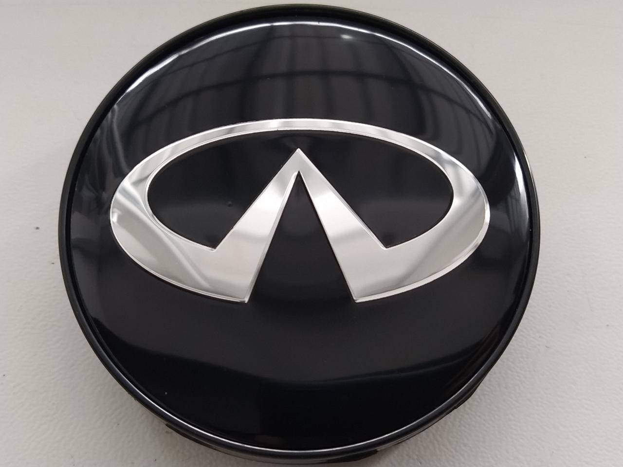 

Колпачки заглушки в литые диски Infiniti 60/56/10 мм. Черные Черная основа