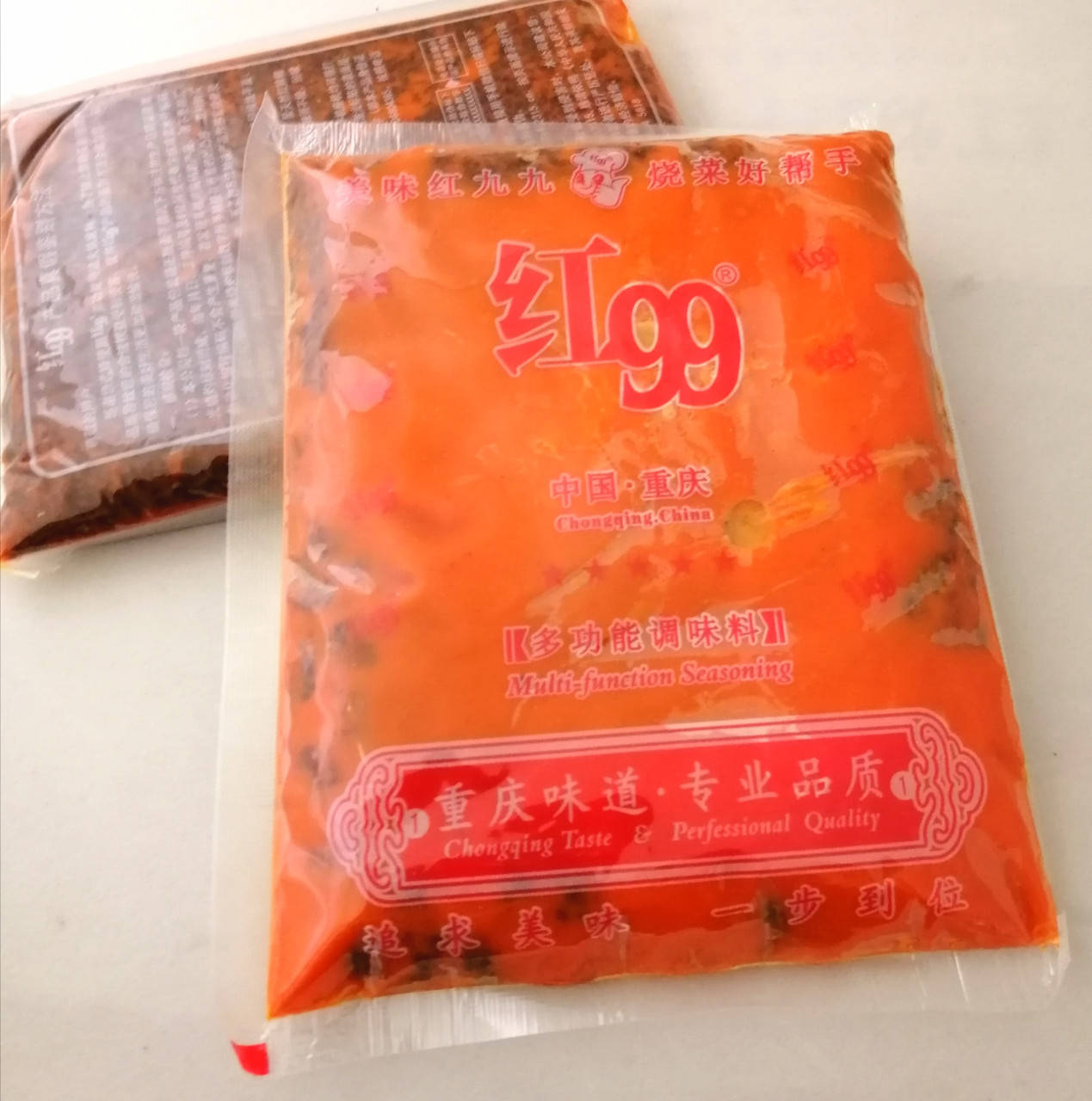 

Бульонная основа для чунсинского Хого "Red 99 " 400g tm Hong Jiu Jiu
