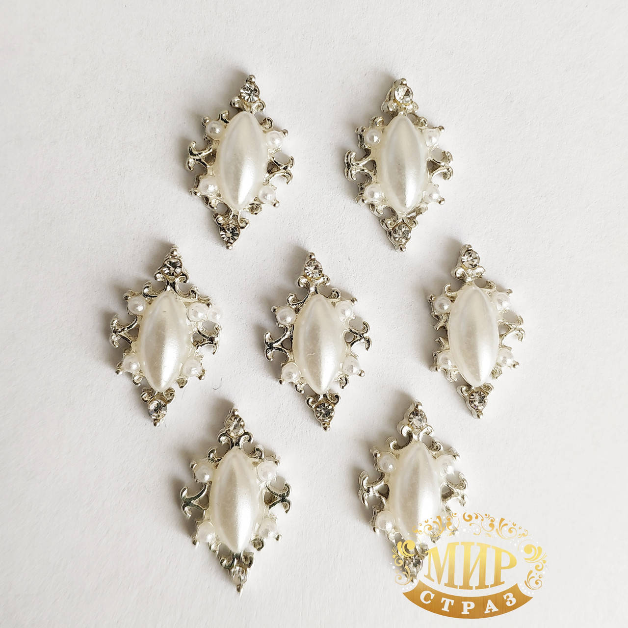 

Декор для нейл-арт в серебре .Размер 6х11мм .Цена за 1шт