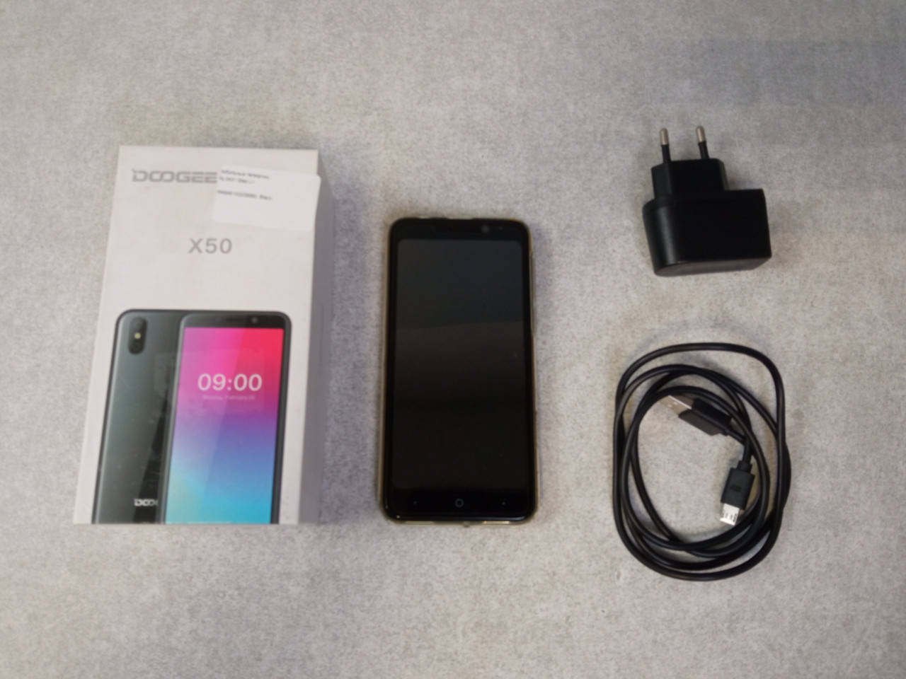 

Мобильный телефон смартфон Б/У Doogee X50 1/8Gb Black, Черный