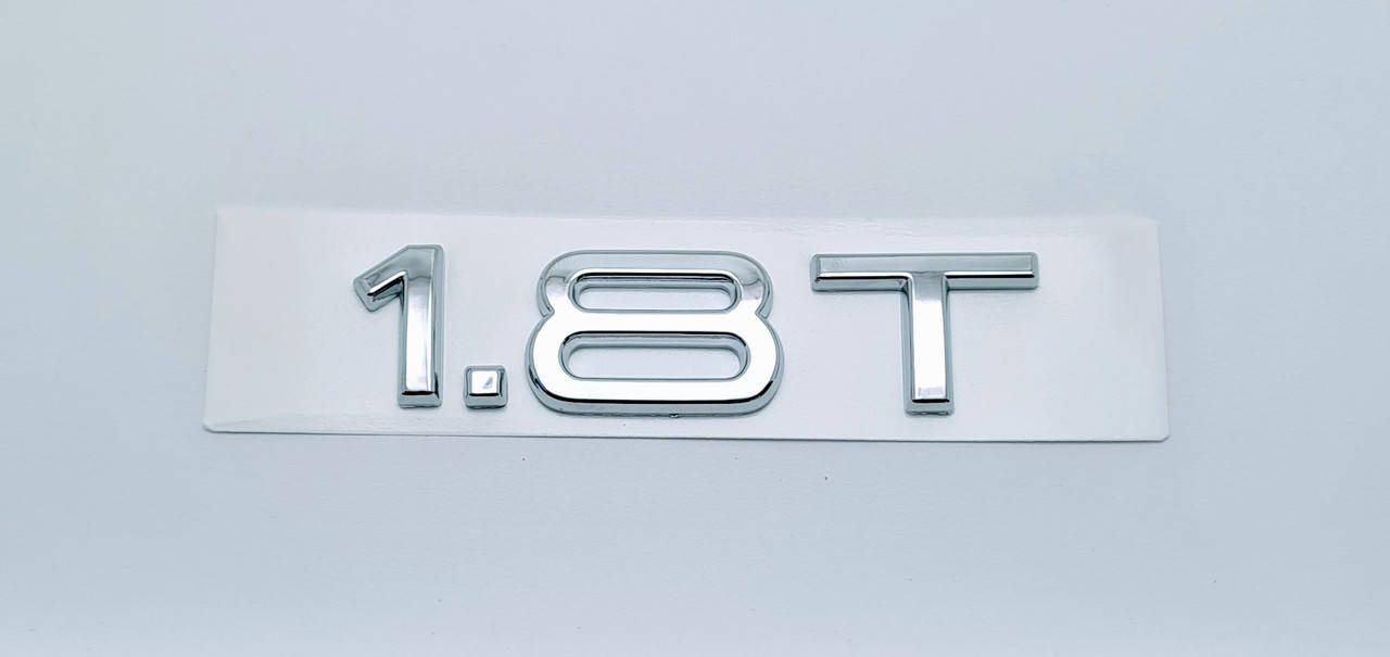 

Эмблема надпись багажника Audi 1.8T