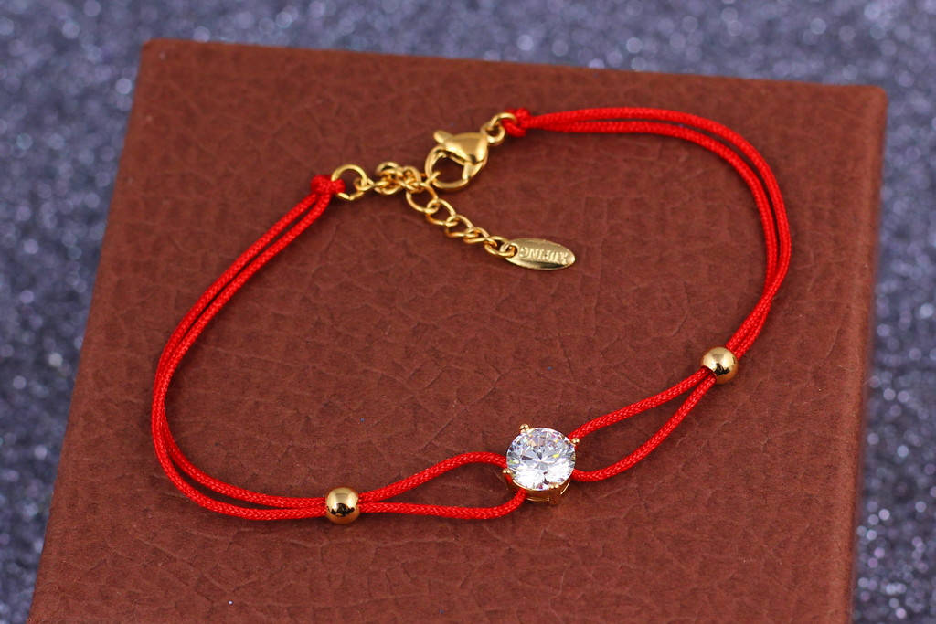 

Браслет Xuping Jewelry красная нить 17 см добавка цепи 3 см с камнем 8 мм золотистый