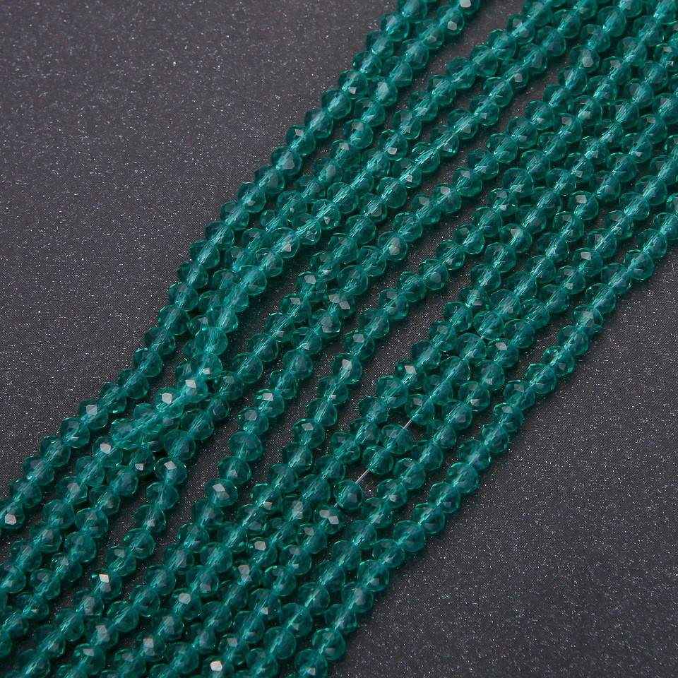 

Бусины стекло прозрачное малахитовое "рондель" d-3,5х3мм нитка L-38см