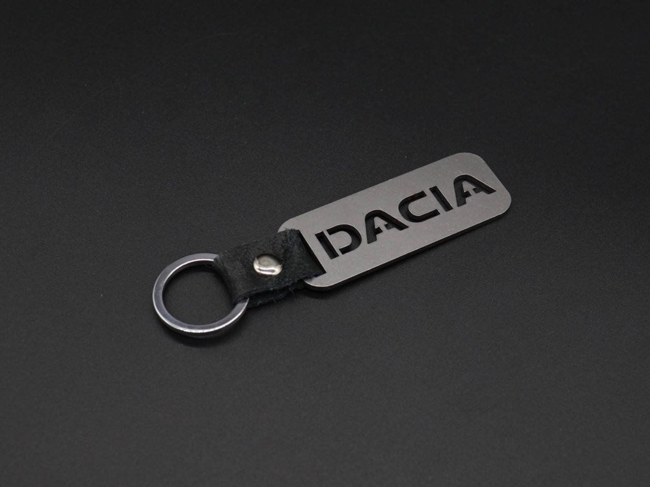

Брелок металлический. Dacia. 10х2,5см, Коричневый