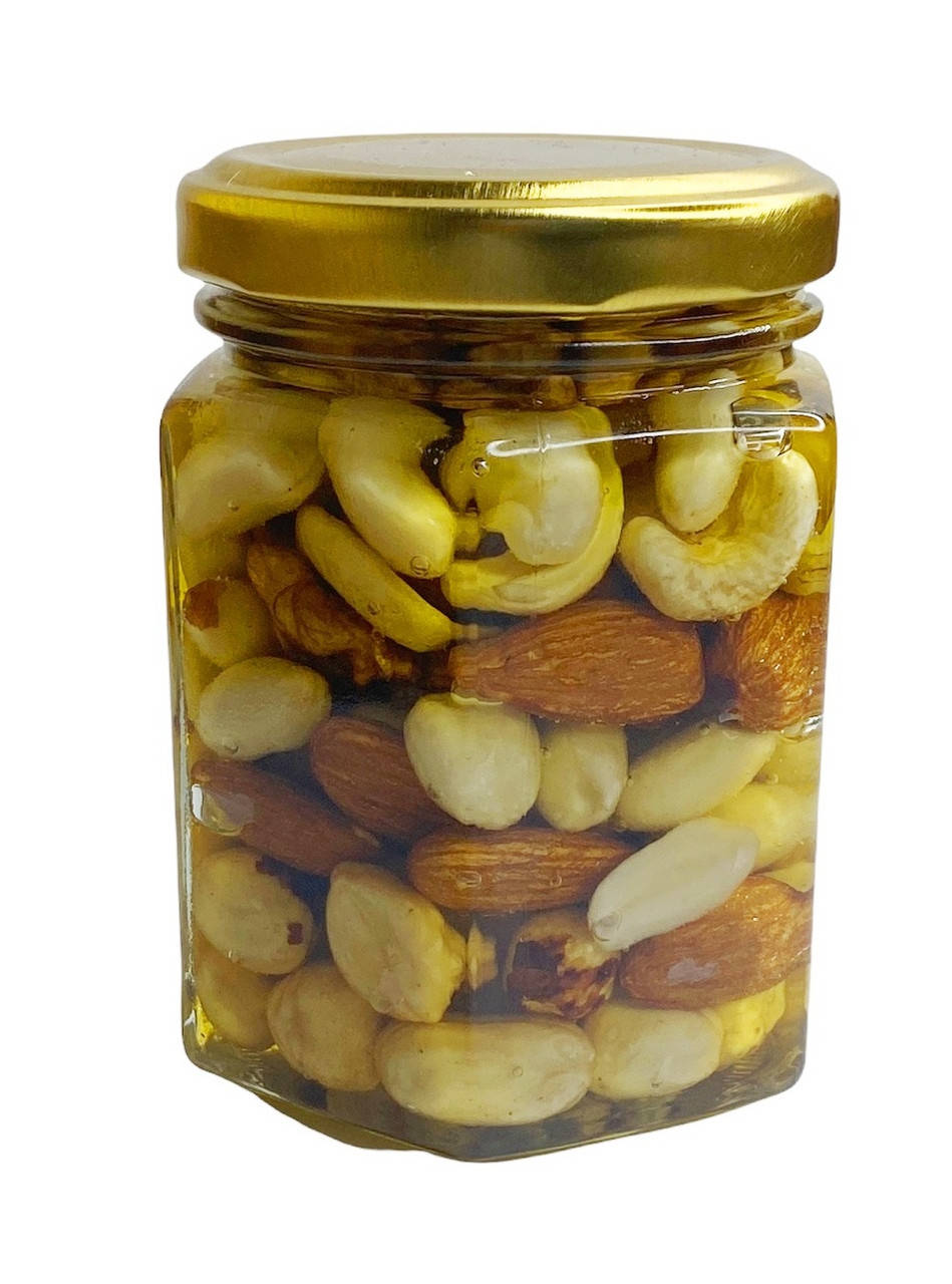 

Мёд с орехами ассорти, банка-шестигранник, 230 г.
