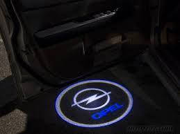 

Логотип подсветка двери Опель Lazer door logo light Opel