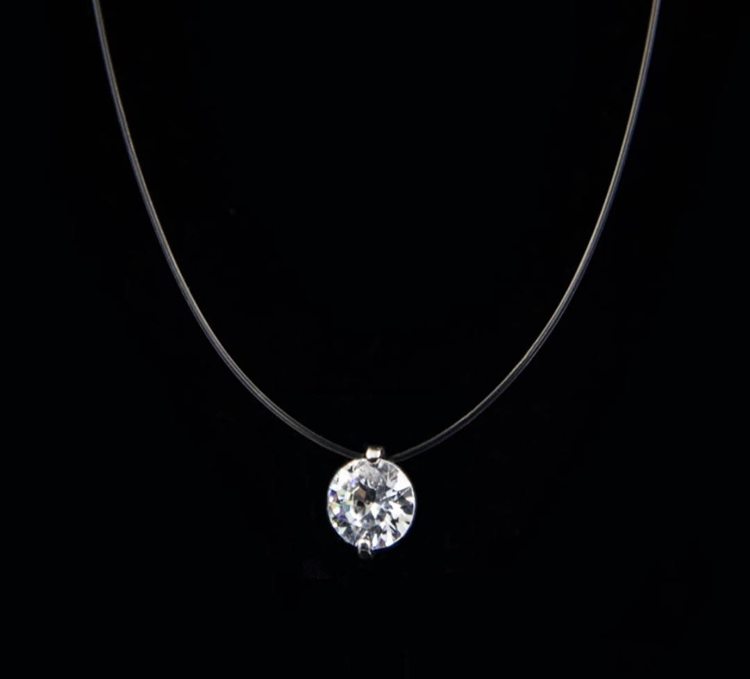 

Колье с большим кристаллом на леске