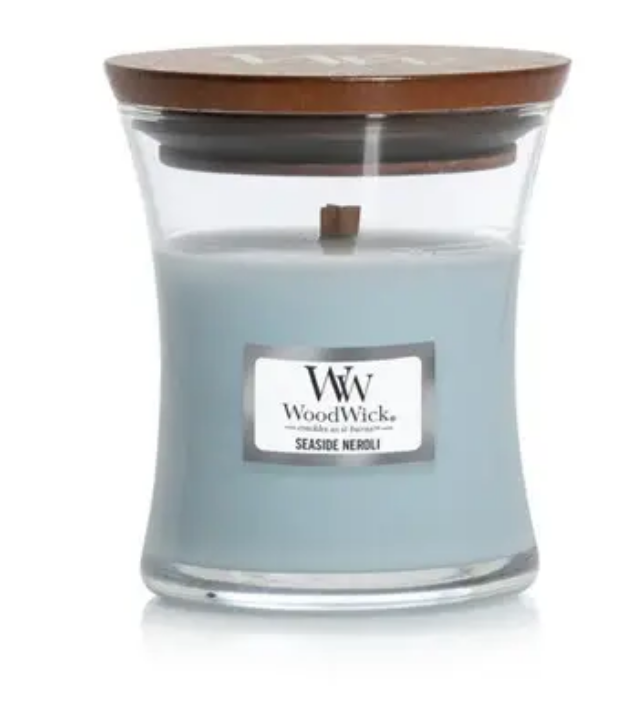 

Ароматическая свеча с ароматом цветов нероли и мандарина Woodwick Mini Seaside Neroli 85 г