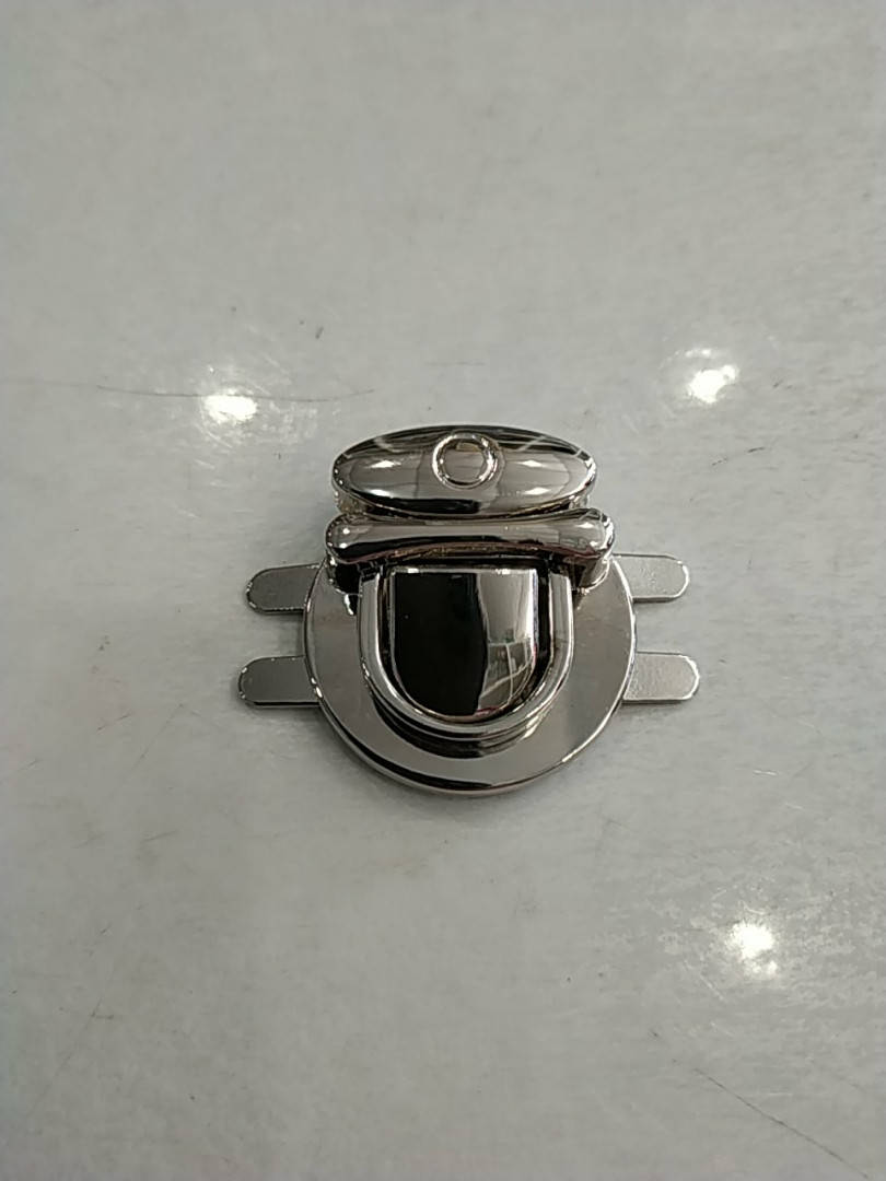 

Замок сумочный никель 30х30мм.