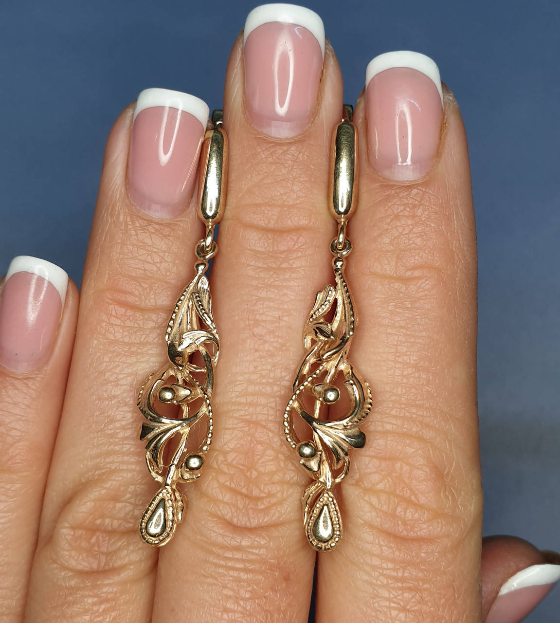 

Сережки позолоченные 7,08 г
