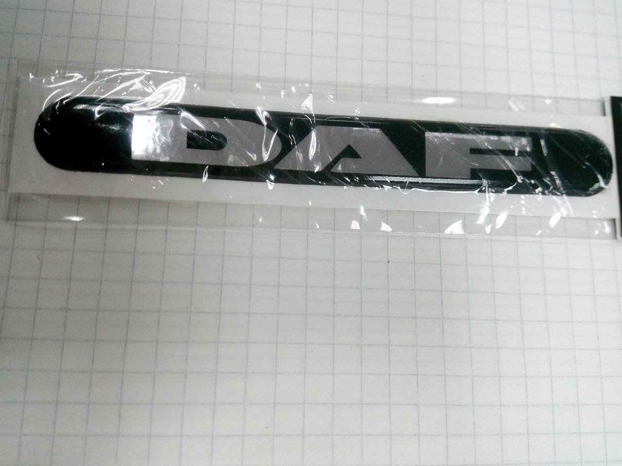 

Силиконовая 3D наклейка DAF 11х1,4 см