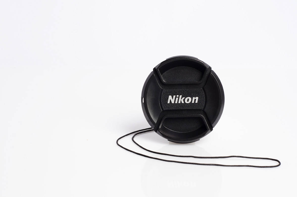 

Крышка на объектив с надписью Nikon 52 mm